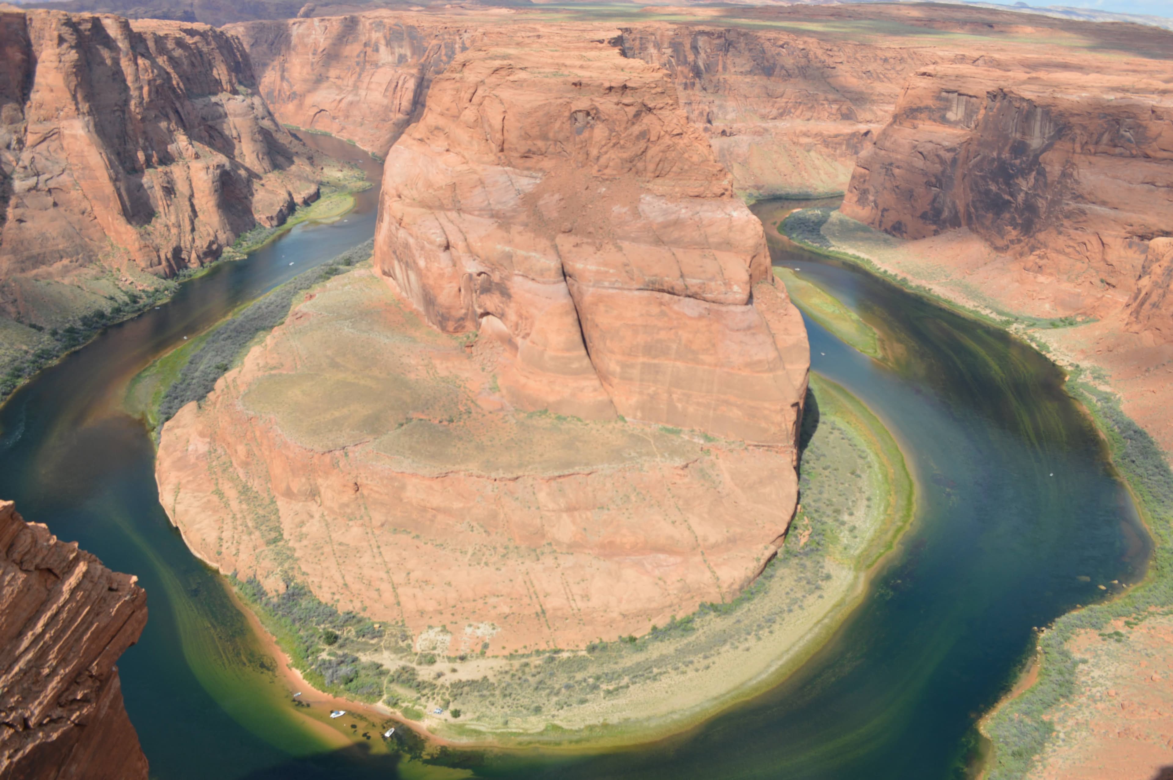 Dramatic rock formation overlooking a meandering river canyon