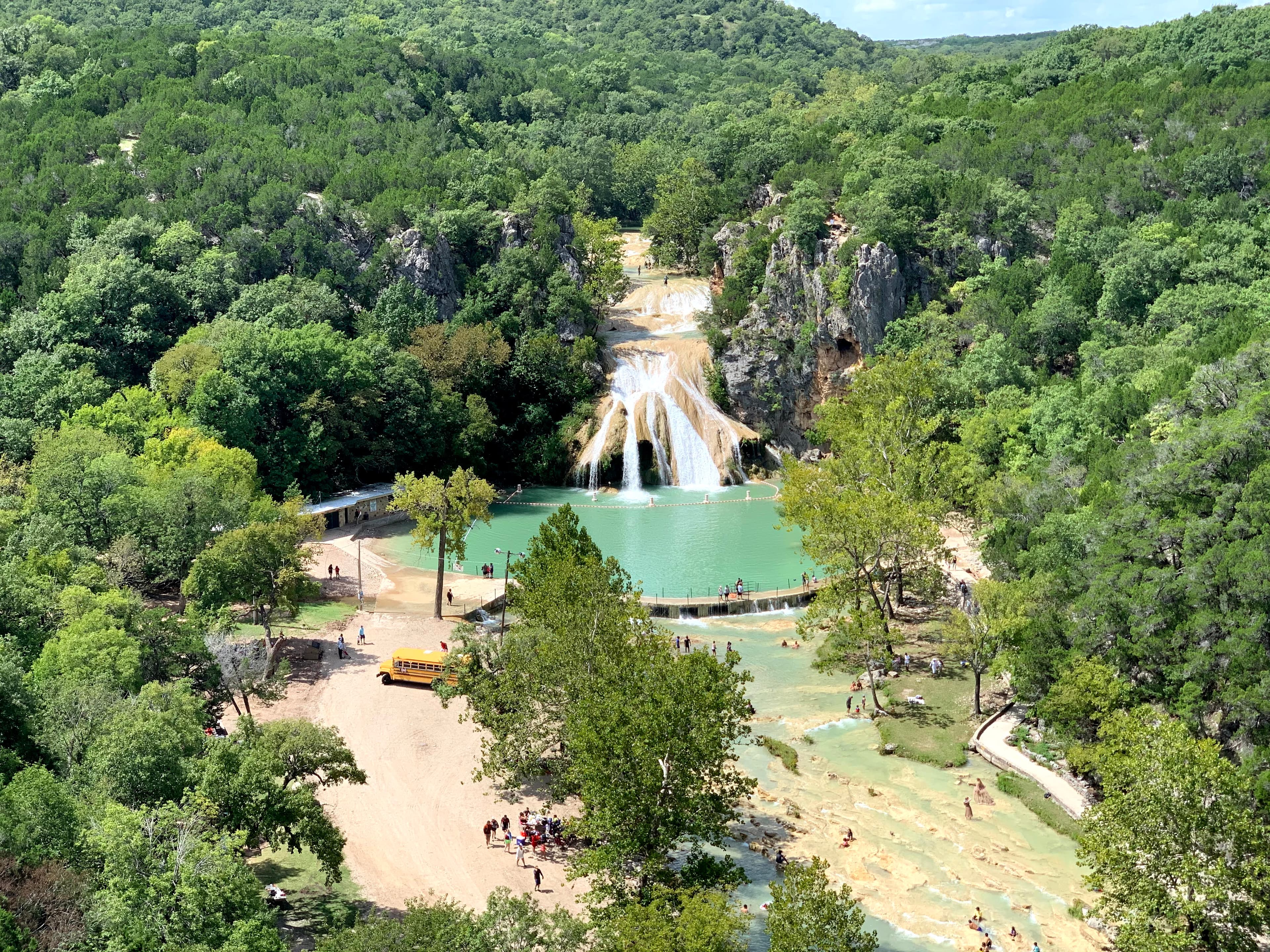 Multiple waterfall streams in a scenic park setting